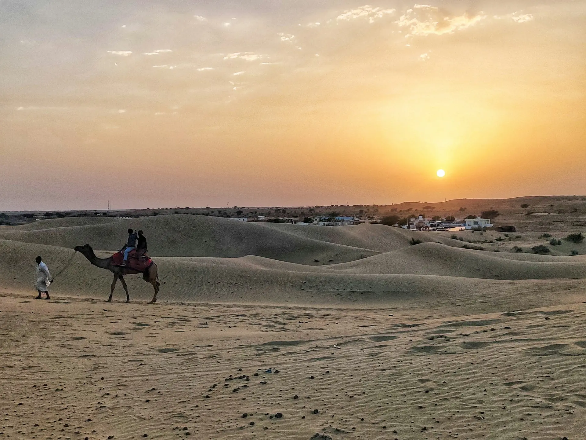 Camel safari at sunset on the Jaisalmer sand dunes – Rajasthan desert tour